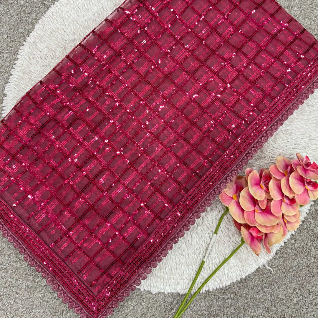 Pink Net saree embellished with Sequin
