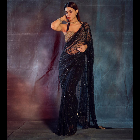 Beautiful Black Net saree embellished with Sequin & unstitched golden sequin blouse