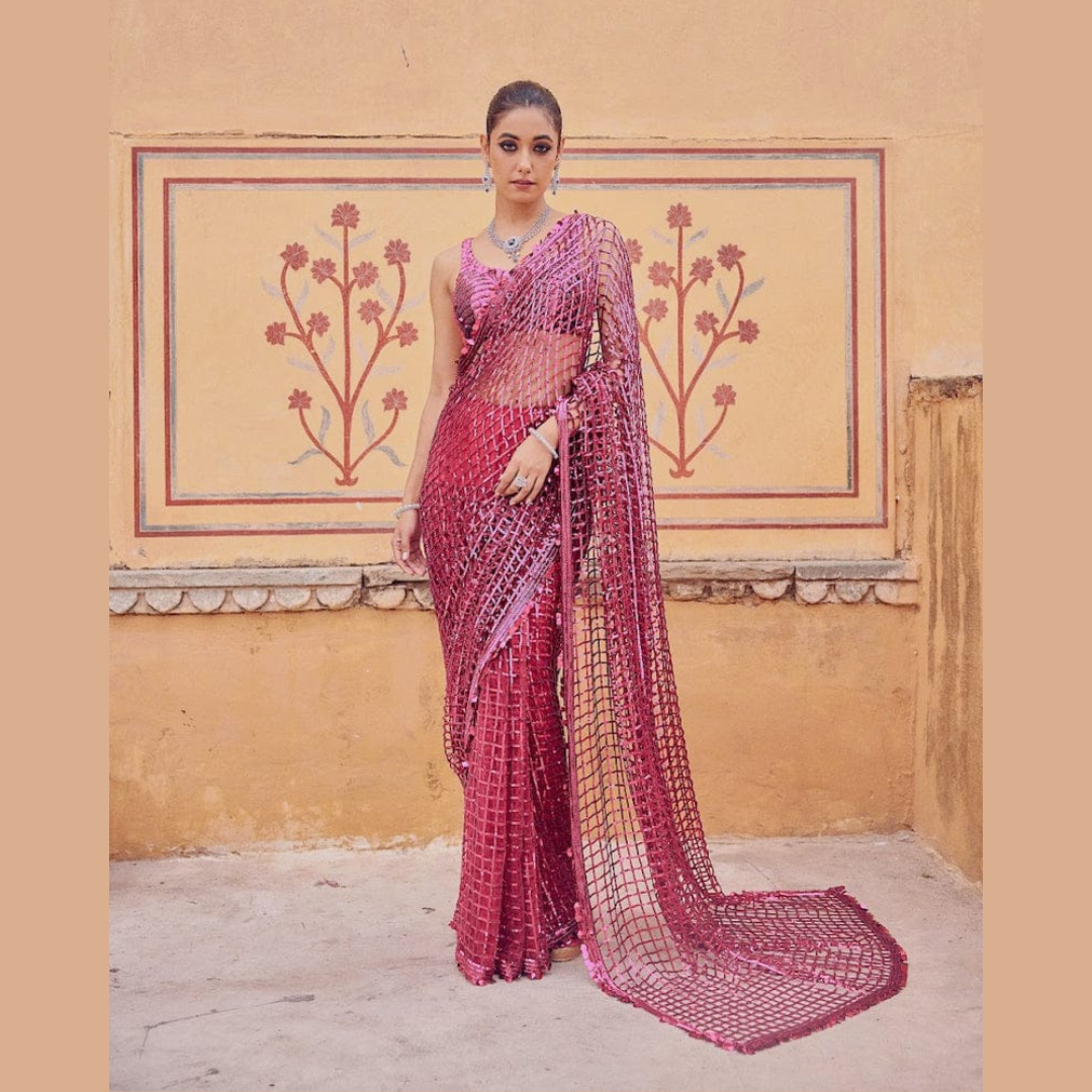 Pink Net saree embellished with Sequin