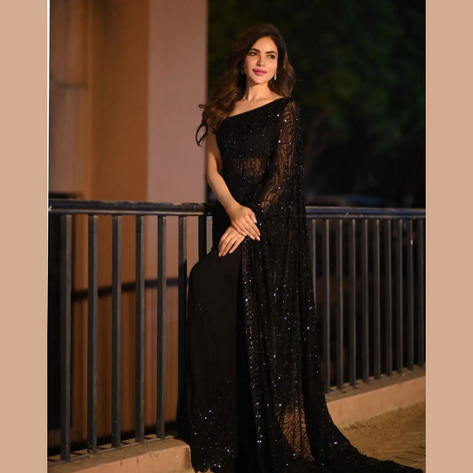 A Black Georgette saree embellished with Sequin