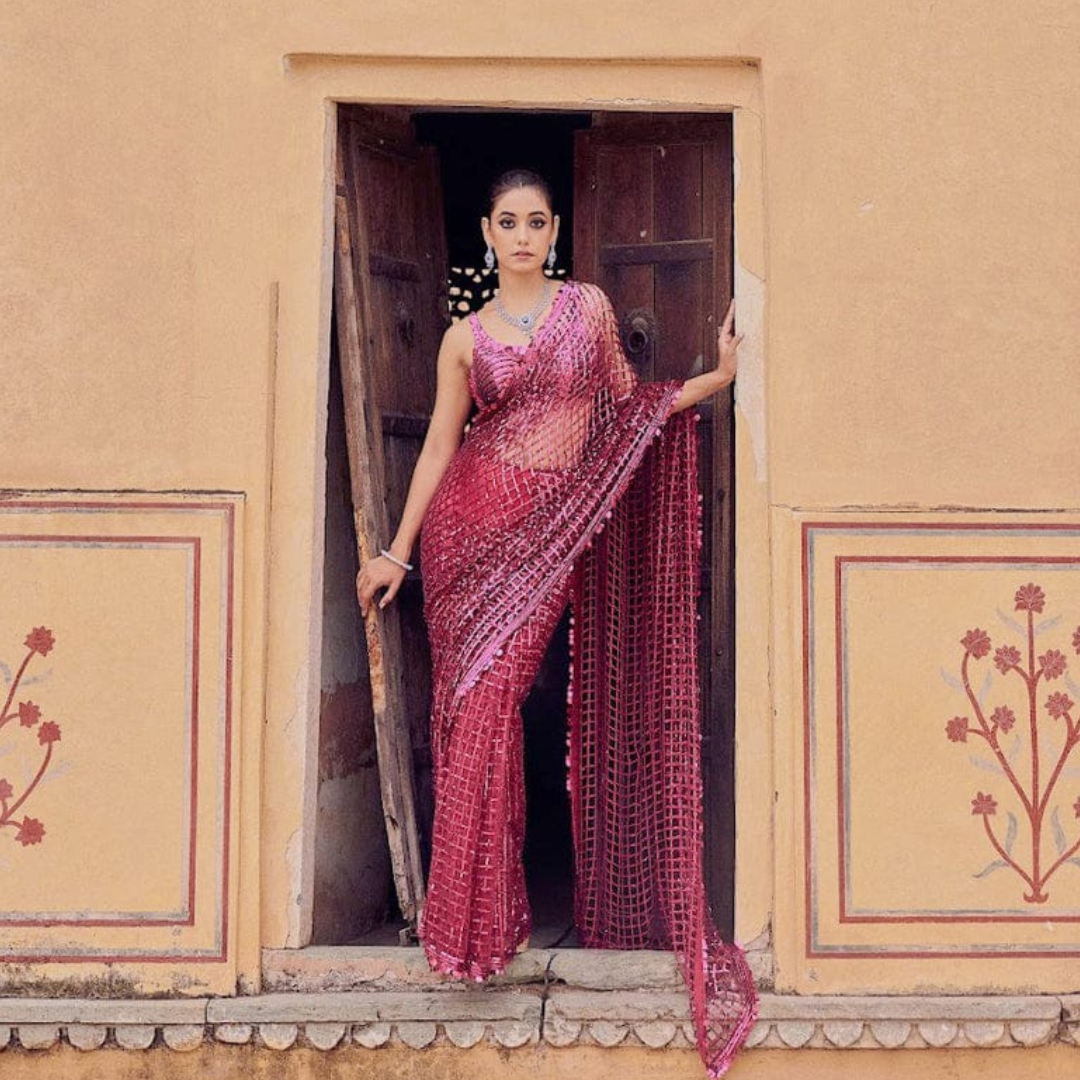 Pink Net saree embellished with Sequin