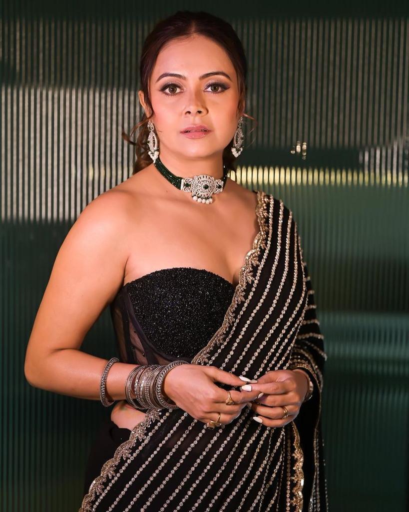 Beautiful Black Georgette saree embellished with Sequin lining