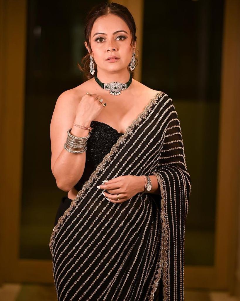 Beautiful Black Georgette saree embellished with Sequin lining