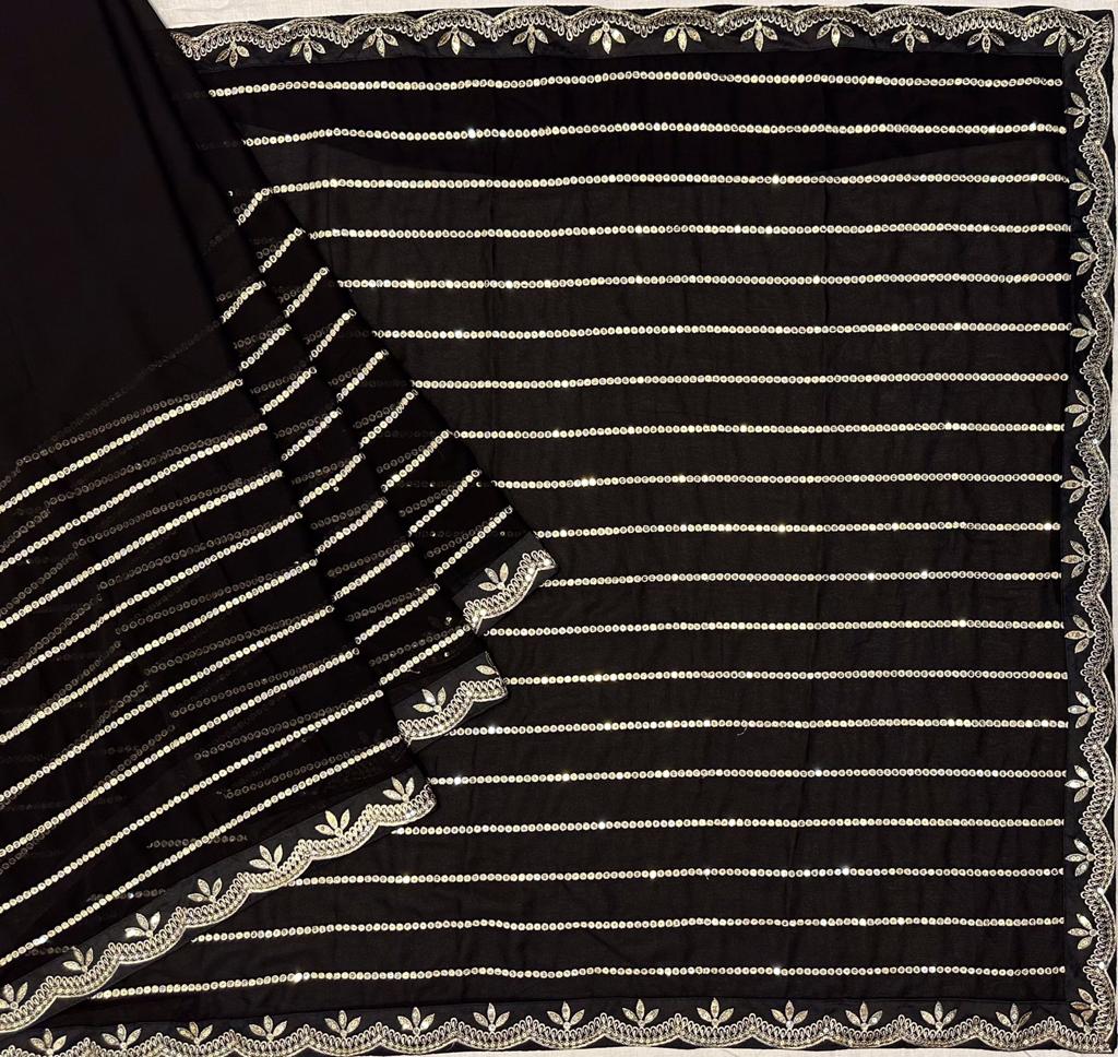 Beautiful Black Georgette saree embellished with Sequin lining