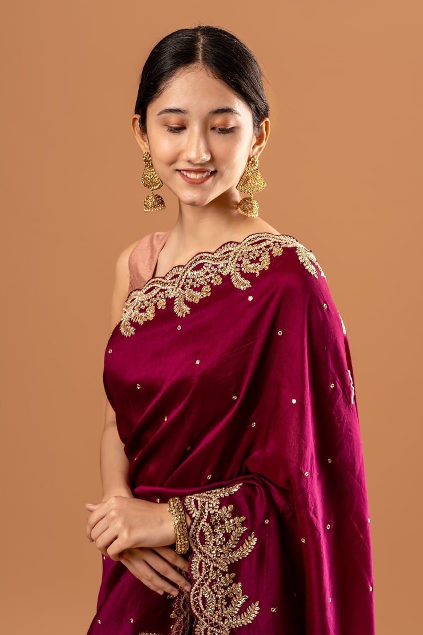 Red Silk Saree embellished with golden Sequin